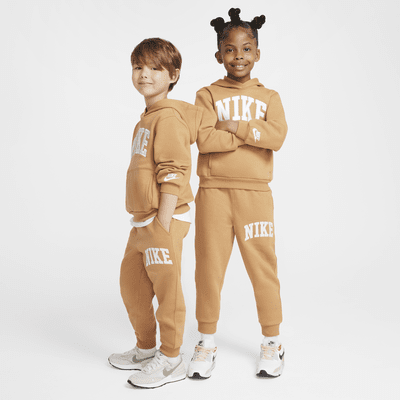 Pants de tejido Fleece con apliques para niños talla pequeña Nike Sportswear Club 