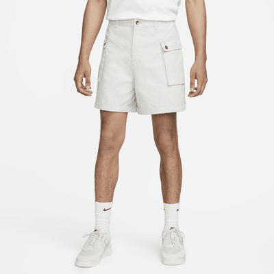 white nike woven shorts