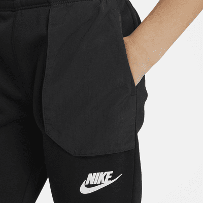 Pantalones de entrenamiento de tejido Fleece para niños talla pequeña Nike Sportswear
