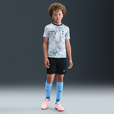 Tottenham Hotspur Academy Pro hazai Nike Dri-FIT mérkőzés előtti, rövid ujjú futballfelső nagyobb gyerekeknek