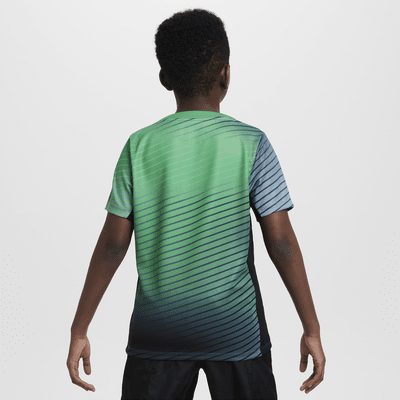 Předzápasové fotbalové tričko Nike Dri-FIT Nigeria Academy Pro pro větší děti s krátkým rukávem