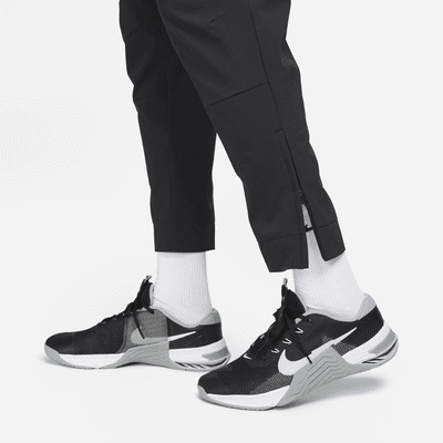 Pantalon avec ouvertures à zip Nike Dri-FIT Unlimited pour homme