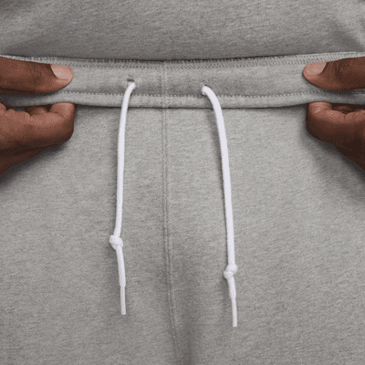 Nike Solo Swoosh Fleece-Hose mit offenem Saum für Herren