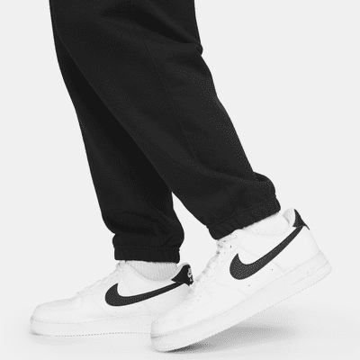 Nike Solo Swoosh Men's French Terry Trousers. Nike SG