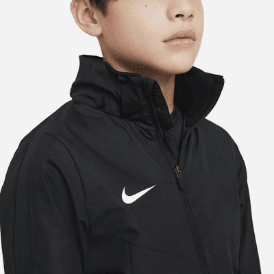 Nike Storm-FIT Academy23 Older Kids' Football Rain Jacket. Nike RO