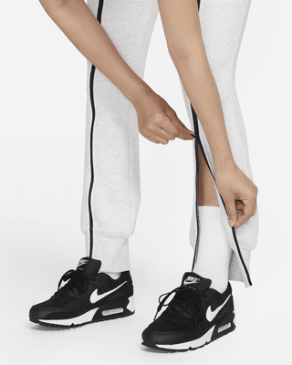 Nike Sportswear Tech Fleece Women's High-Waisted Slim Zip Pants.