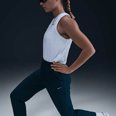 Nike Dri-FIT Fast Pantalón de running de talle medio con diseño 7/8 - Mujer