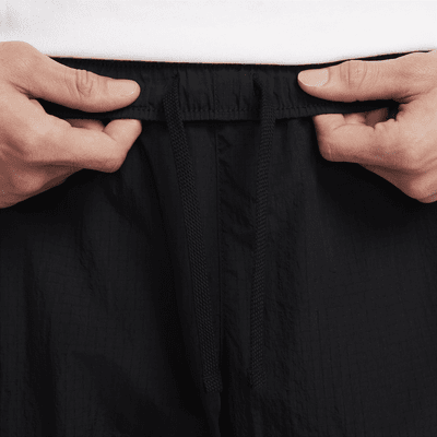 Pantaloni leggeri in tessuto Nike Air – Uomo