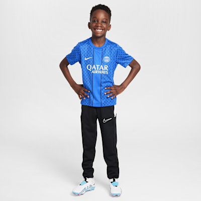 Przedmeczowa koszulka piłkarska z krótkim rękawem dla małych dzieci Jordan Dri-FIT Paris Saint-Germain Academy Pro (wersja domowa)