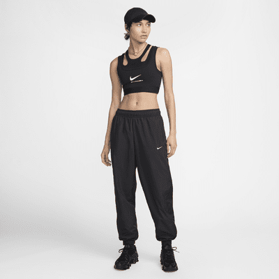 Joggers de tiro medio holgados con protección contra los rayos UV para mujer Nike Sportswear Classic Wovens