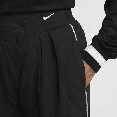 Pantalon taille mi-haute asymétrique déperlant Nike Sportswear Collection pour femme