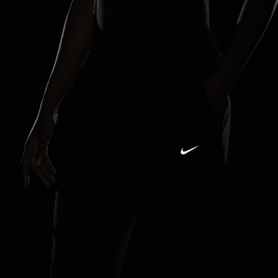 Pantaloni da running da riscaldamento a 7/8 a vita media Nike Dri-FIT Fast – Donna