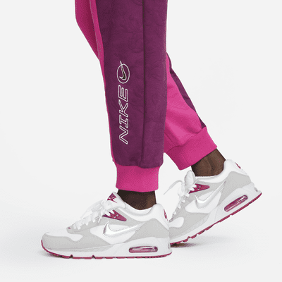 Pantalones de tejido Fleece de tiro medio para mujer Nike Sportswear Icon Clash