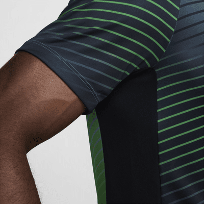 Pánské předzápasové fotbalové tričko Nike Dri-FIT Nigeria Academy Pro s krátkým rukávem