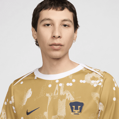 Playera de fútbol de manga corta Nike Dri-FIT para antes del partido para hombre Pumas UNAM Academy Pro