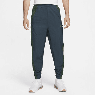 Nike Windrunner Winterized Woven Trousers in Grey for Men | Lyst UK