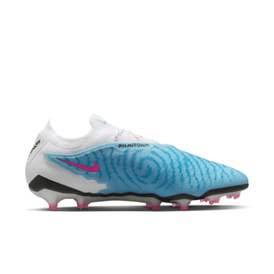 Tacos de fútbol de corte low para terreno firme Nike Phantom GX Elite