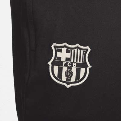 Męskie spodnie piłkarskie z dzianiny Nike Dri-FIT FC Barcelona Strike