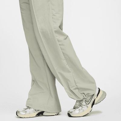 Pants de tiro medio con dobladillo abierto para mujer Nike Sportswear Everything Wovens