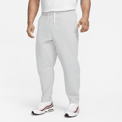 Nike Club Men's Woven Tapered-Leg Trousers. Nike SK