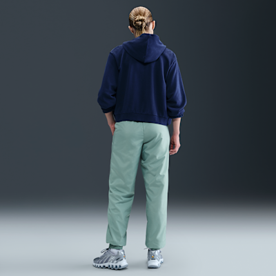 Joggers de tiro medio holgados con protección contra los rayos UV para mujer Nike Sportswear Classic Wovens