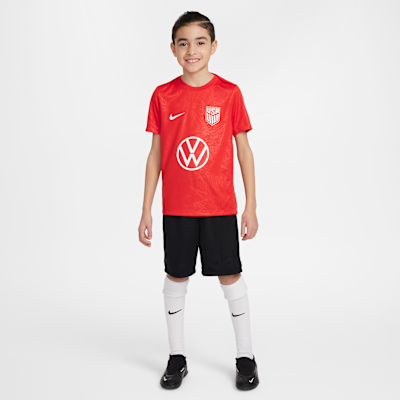 Playera de fútbol de manga corta Nike Dri-FIT para antes del partido para niños talla grande USMNT Academy Pro