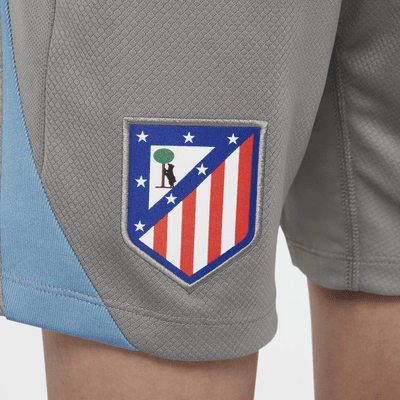 Fotbalové pleteninové kraťasy Nike Dri-FIT Atlético Madrid Strike pro větší děti