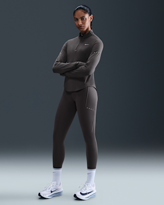 Женские тайтсы Nike Swift High-Waisted 7/8 Leggings with Pockets для бега