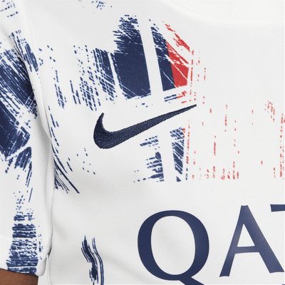 Maglia da calcio pre-partita a manica corta Nike Dri-FIT Paris Saint-Germain Academy Pro per ragazzo/a – Away