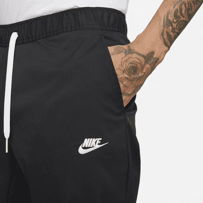 Pants entallados de tejido Woven para hombre Nike Club