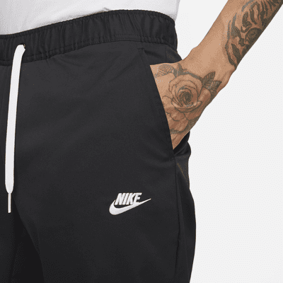 Nike Club Men's Woven Tapered-Leg Trousers. Nike UK