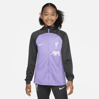 Liverpool F.C. Strike Older Kids' Nike Dri-FIT Hooded Tracksuit. Nike RO