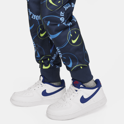 Conjunto de entrenamiento infantil Nike Smiley Swoosh Printed Tricot Set