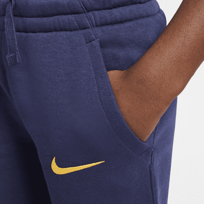 Joggery piłkarskie dla dużych dzieci (chłopców) Nike Inter Mediolan Club Fleece (wersja trzecia)