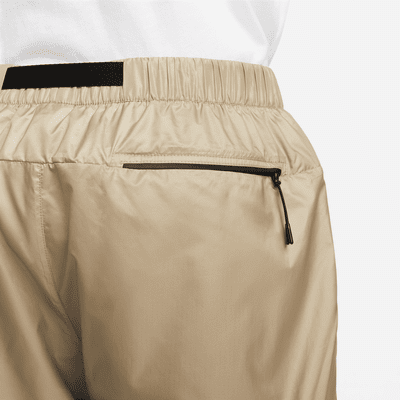 Pantaloni in tessuto con fodera Nike Tech – Uomo