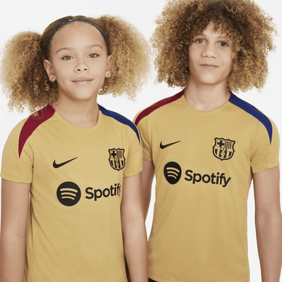 FC Barcelona Strike Nike Dri-FIT rövid ujjú, kötött futballfelső nagyobb gyerekeknek