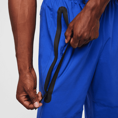 Calças folgadas entrançadas Nike Tech para homem