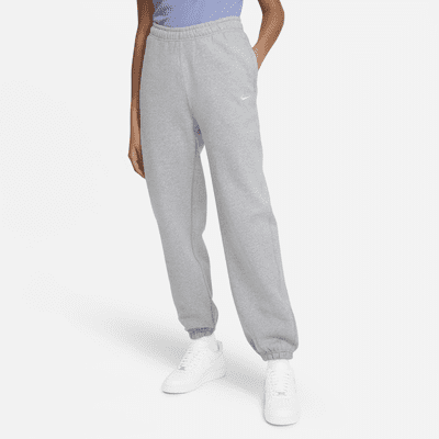 Nike Solo Swoosh Pantalons de teixit Fleece - Dona