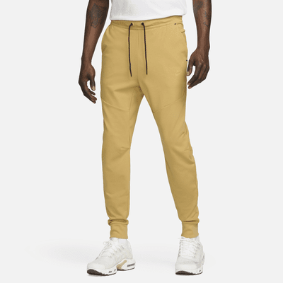 NIKE Nike Sportswear Tech Essentials Men's Woven Joggers, Khaki Men's  Casual Pants