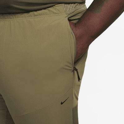 Nike A.P.S. Pants versátiles de tejido Woven Dri-FIT ADV para hombre