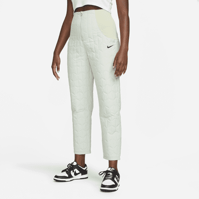 Pantaloni in tessuto trapuntato a vita alta Nike Sportswear Essentials -  Donna. Nike IT
