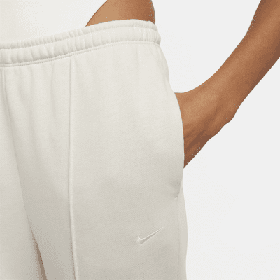 Calças de fato de treino estreitas de cintura subida em tecido moletão Nike Sportswear Chill Terry para mulher