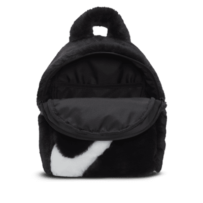 Effortless style for everyday with the Nike Futura 365 Mini Backpack. Cozy  faux fur meets iconic sportswear. Ready for any adventure. 🎒❄️…
