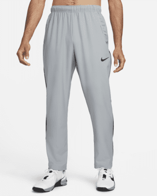 chef tand Prestatie Nike Dri-FIT Men's Woven Team Training Trousers. Nike ID