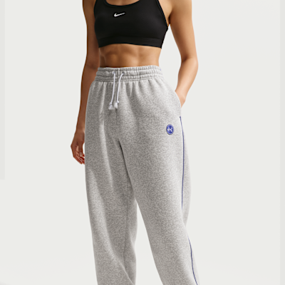 Calças folgadas de cintura subida com grafismo Nike Sportswear Phoenix Fleece para mulher