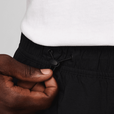 Pantaloni oversize in tessuto Nike Tech – Uomo