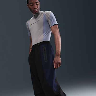 Pants de tejido Woven Dri-FIT de colores contrastantes de ajuste holgado para hombre Nike Tech