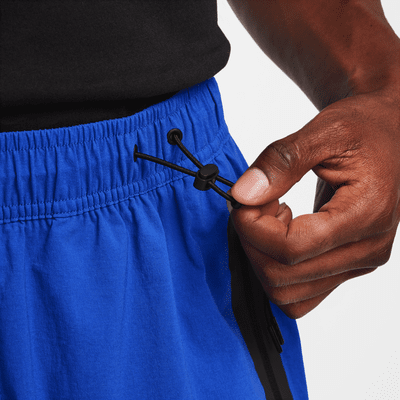 Pantaloni oversize in tessuto Nike Tech – Uomo