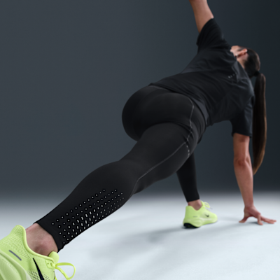 Leggings da running a 7/8 a vita alta con dettagli dal design rifrangente Nike Swift – Donna