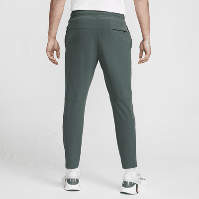 Pants versátiles Dri-FIT de pierna entallada para hombre Nike Unlimited